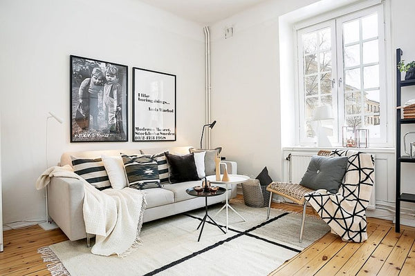 http://www.loftdesigncompany.ca/cdn/shop/articles/Small-living-room-of-an-elegant-Stockholm-apartment_600x.jpg?v=1563422406